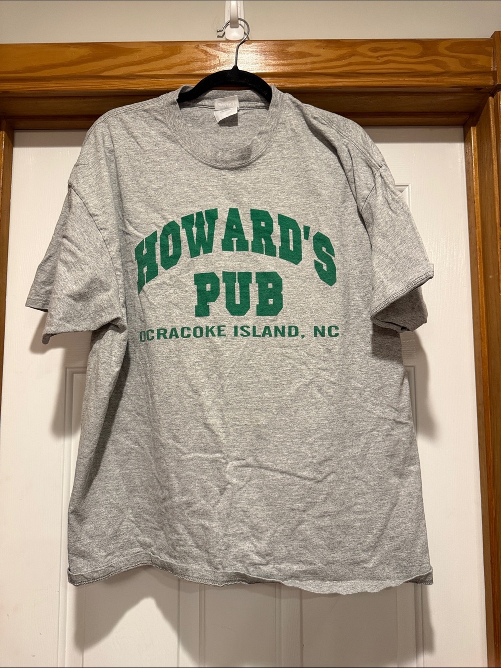 Port and Company Gray Tee with Green Howard's Pub Logo